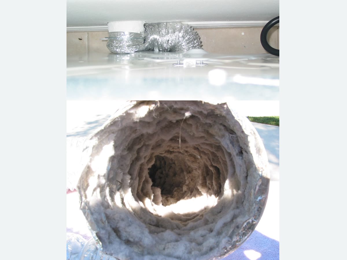 A kinked foil dryer hose and lint coating the inside of the hose.